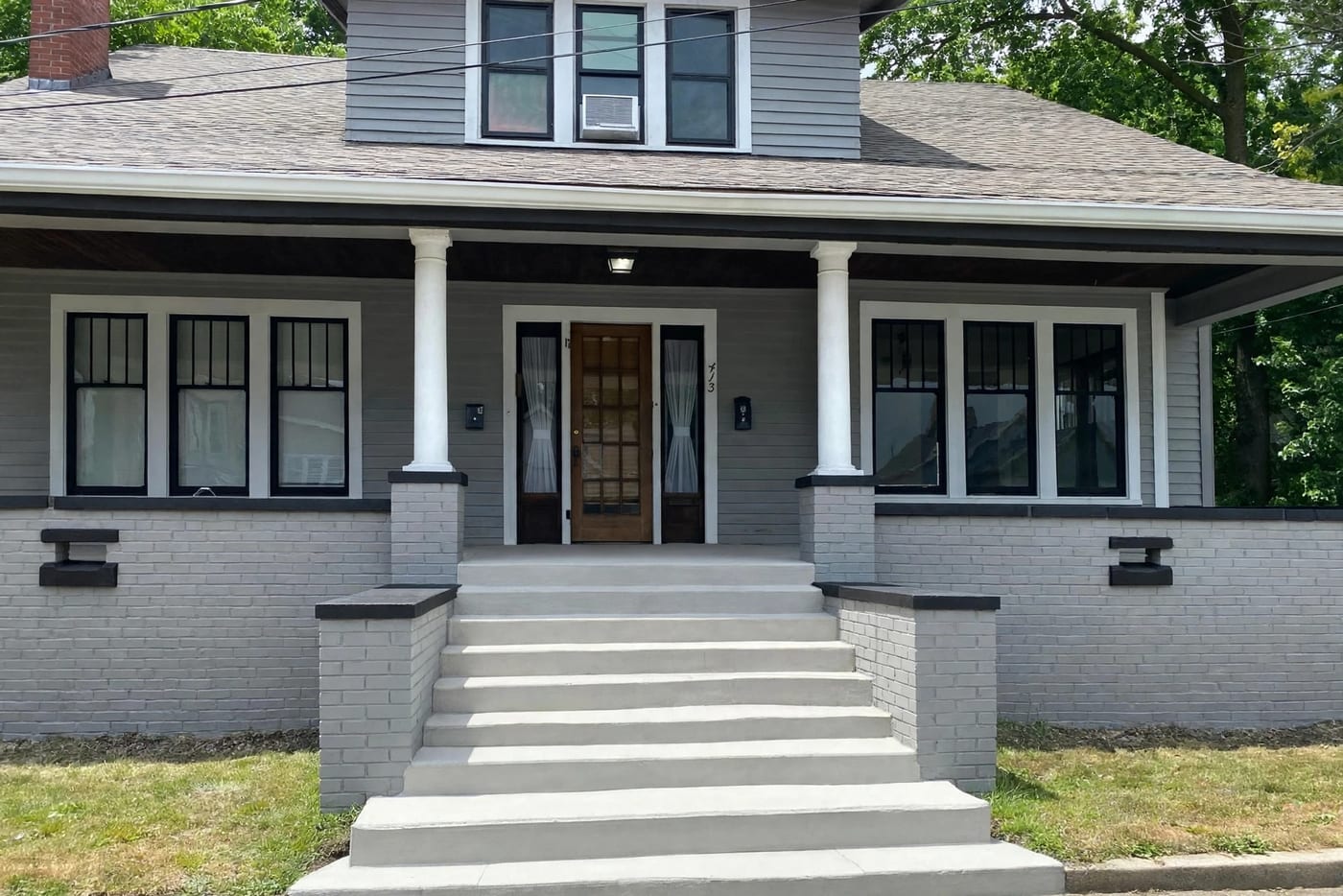 The men's recovery house on South Pike Street in Shelbyville: a two story home with a covered porch and white columns